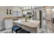Modern kitchen featuring stainless steel appliances, granite countertops, and island seating at 7140 E Juanita Ave, Mesa, AZ 85209
