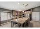 Bright kitchen featuring stainless steel appliances, spacious countertops, and a custom backsplash at 7925 E Osage Ave, Mesa, AZ 85212