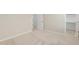 Bright bedroom features neutral carpet, baseboards, and trim throughout at 794 W Leatherwood Ave, Queen Creek, AZ 85140