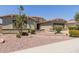 Single-story home boasting a desert landscape, attached garage, and neutral-toned exterior at 794 W Leatherwood Ave, Queen Creek, AZ 85140