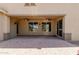 Spacious covered patio features brick pavers and ceiling fans at 794 W Leatherwood Ave, Queen Creek, AZ 85140