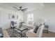 Cozy living room featuring a plush sofa, chairs, and stylish decor at 1021 S Almar Cir, Mesa, AZ 85204