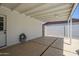 This covered patio features a hose bib and epoxy floors at 1021 S Almar Cir, Mesa, AZ 85204
