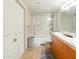 Bright bathroom features a shower over tub and double sinks with lots of vanity storage at 114 W Adams St # 505, Phoenix, AZ 85003