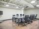 Modern conference room with a large table, comfortable chairs, and professional ambiance at 114 W Adams St # 505, Phoenix, AZ 85003