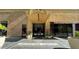 Inviting Orpheum Lofts entrance with manicured planters, tiled walkway, and awning for a touch of urban luxury at 114 W Adams St # 505, Phoenix, AZ 85003