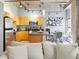 Modern kitchen with island seating, stainless steel appliances, and natural light at 114 W Adams St # 505, Phoenix, AZ 85003