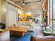 Open-concept living room with bright kitchen, and large windows at 114 W Adams St # 505, Phoenix, AZ 85003