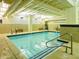 Indoor pool with bright lighting, easy access and tiled deck at 114 W Adams St # 505, Phoenix, AZ 85003