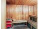 Relaxing sauna room with wood paneling, benches and traditional sauna equipment at 114 W Adams St # 505, Phoenix, AZ 85003