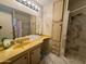 Modern bathroom with stylish finishes, vanity with sink, large mirror and shower stall at 120 N Val Vista Dr # 272, Mesa, AZ 85213