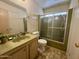 Bathroom with a tub featuring vanity with sink, toilet and good lighting at 120 N Val Vista Dr # 272, Mesa, AZ 85213