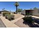 Exterior view of the property featuring desert landscaping and a covered carport at 120 N Val Vista Dr # 272, Mesa, AZ 85213