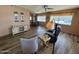 Spacious living room with laminated floors, natural light, and comfortable seating at 120 N Val Vista Dr # 272, Mesa, AZ 85213