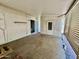 Enclosed outdoor patio featuring carpet flooring and sliding door access to the indoors at 120 N Val Vista Dr # 272, Mesa, AZ 85213