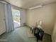 Room with a sliding glass door leading to a covered patio, an accent chair and side table at 120 N Val Vista Dr # 272, Mesa, AZ 85213