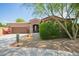 Charming single story home featuring low maintenance desert landscaping and attached two car garage at 1225 S 160Th Ln, Goodyear, AZ 85338