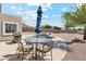 Charming backyard showcasing a pool, outdoor dining area, and a grill, perfect for entertaining guests at 1228 E Mountain Vista Dr, Phoenix, AZ 85048