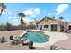 Inviting backyard oasis featuring a pool, desert landscaping, patio and spiral staircase at 1228 E Mountain Vista Dr, Phoenix, AZ 85048