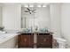 Bathroom with dual glass vessel sinks and modern fixtures at 1228 E Mountain Vista Dr, Phoenix, AZ 85048