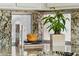 Granite countertop is decorated with a plant, cookbook, and challah at 1228 E Mountain Vista Dr, Phoenix, AZ 85048