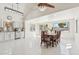 Open dining area with elegant table and chairs adjacent to kitchen at 1228 E Mountain Vista Dr, Phoenix, AZ 85048