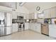Modern kitchen featuring stainless steel appliances, granite countertops, and white cabinetry at 1228 E Mountain Vista Dr, Phoenix, AZ 85048