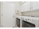 Convenient laundry room equipped with modern washer and dryer at 1228 E Mountain Vista Dr, Phoenix, AZ 85048