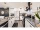 Spacious kitchen with granite countertops, stainless steel appliances, and lots of cabinet space at 128 E Bluejay Dr, Chandler, AZ 85286