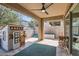 Outdoor patio with pavers, playhouse, and covered space for relaxing at 128 E Bluejay Dr, Chandler, AZ 85286