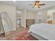 Spacious primary bedroom with hardwood floors and a dressing mirror at 13450 E Via Linda -- # 2022, Scottsdale, AZ 85259