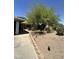 Lush landscaping surrounds this home, with mature trees providing ample shade and privacy at 14402 N Saguaro Blvd # A, Fountain Hills, AZ 85268