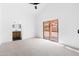 Bright bedroom with vaulted ceiling, carpet flooring, and an ensuite bathroom at 14418 S 42Nd St, Phoenix, AZ 85044