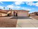 Single-Gathering home featuring an attached garage, desert landscaping, and beautiful architecture that offers a charming curb appeal at 14418 S 42Nd St, Phoenix, AZ 85044