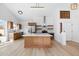 Bright and spacious kitchen with modern appliances, a central island, and light wood flooring at 14418 S 42Nd St, Phoenix, AZ 85044