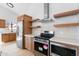 Well-equipped kitchen with stainless steel appliances, modern cabinetry, and open shelving at 14418 S 42Nd St, Phoenix, AZ 85044