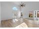 Spacious living room with high ceilings, large windows, and bright natural light at 14418 S 42Nd St, Phoenix, AZ 85044
