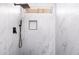 Contemporary shower with sleek fixtures, marble tile, and convenient built-in niche at 14418 S 42Nd St, Phoenix, AZ 85044