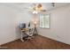 This bedroom features a ceiling fan and lots of natural light at 1525 E Southern Ave, Tempe, AZ 85282