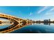 Stunning bridge view reflected in calm water, with clear sky and city buildings in the background at 1525 E Southern Ave, Tempe, AZ 85282