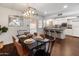 Stylish dining room features a modern light fixture and a mirror at 1525 E Southern Ave, Tempe, AZ 85282