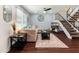 Comfortable living room with a plush couch and decorative rug at 1525 E Southern Ave, Tempe, AZ 85282