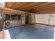 Spacious covered patio with fan, lighting and concrete floor, perfect for outdoor relaxation and entertaining at 1525 E Southern Ave, Tempe, AZ 85282