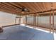The covered patio features concrete floors, a fan, and chain-link fencing, providing a perfect outdoor space at 1525 E Southern Ave, Tempe, AZ 85282