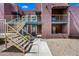 Apartment complex with exterior stairs and gravel landscaping at 16602 N 25Th St # 114, Phoenix, AZ 85032