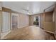 Living room featuring wood floors and a sliding glass door at 16602 N 25Th St # 114, Phoenix, AZ 85032