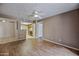 Open concept living area with view into the kitchen at 16602 N 25Th St # 114, Phoenix, AZ 85032
