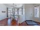 Bright dining area with large arched windows, wood floors and white dining set at 17403 N 16Th Pl, Phoenix, AZ 85022