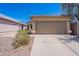 Street view of a charming single-story home with a two-car garage, desert landscaping, and a red tile roof at 17403 N 16Th Pl, Phoenix, AZ 85022
