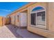 The front entrance is inviting and secure, framed by a desert landscaped yard at 17403 N 16Th Pl, Phoenix, AZ 85022